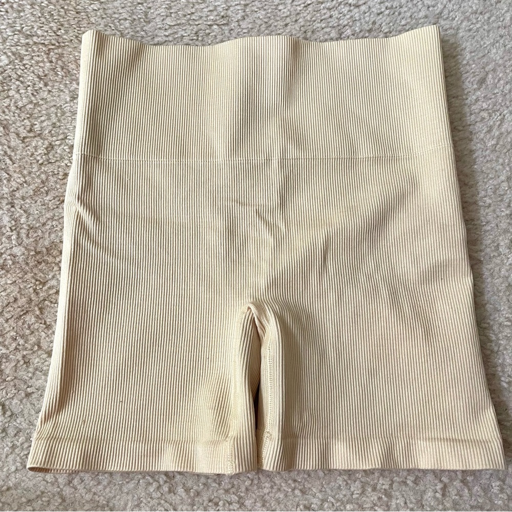 Aritzia TNA yellow ribbed shorts